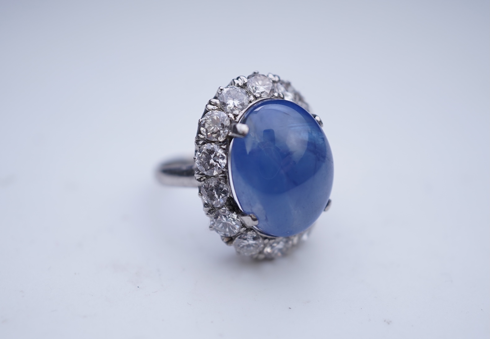 A sapphire and diamond ring, mid 20th century